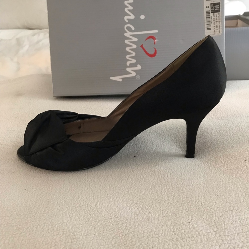 Black satin heels.
